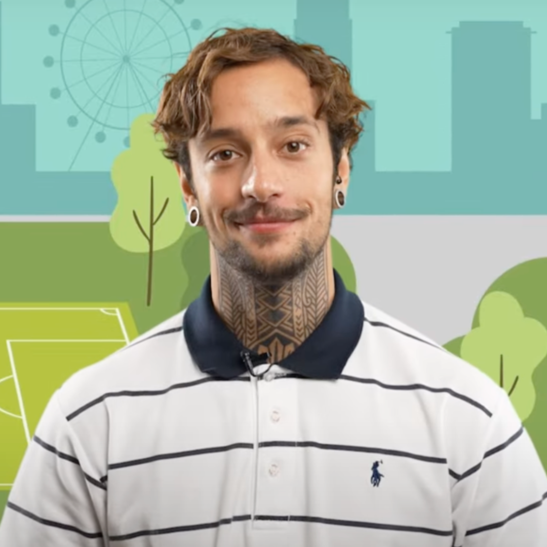 Portrait of Dakota Robin, a DEI expert and human rights trainer, standing in front of an illustrated urban park background.